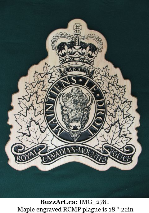 Maple engraved RCMP plague is 18 * 22in